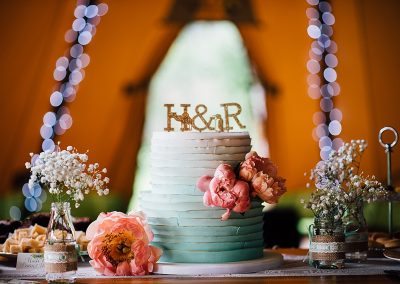 ombre wedding cake with gold cake topper taken by Parrot & Pineapple Wedding Photography