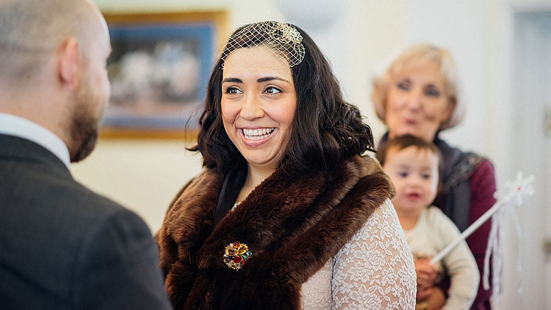 Bride smiling at groom - London elopement wedding