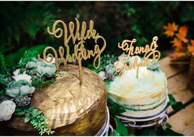 Gold buttercream wedding cake acrylic cake topper Parrot and Pineapple